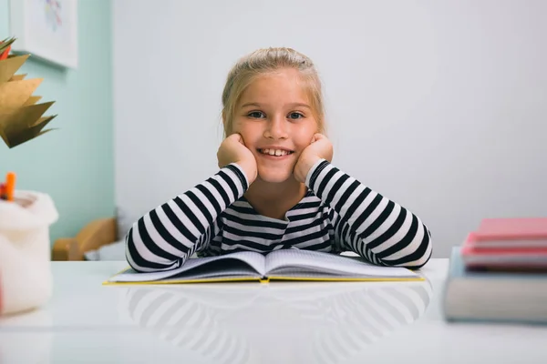 Little Girl Sitting Table Her Room Holding Head Hands — Stock Photo, Image