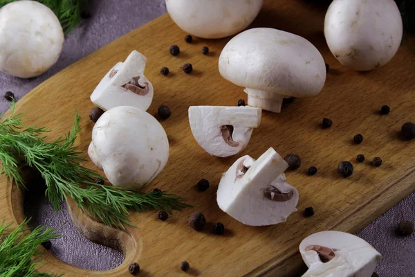 Top view on sliced champignon mushrooms. Ingredients for cooking tasty vegetarian dishes — Stock Image Top View Sliced Champignon Mushrooms Ingredients Cooking Tasty Vegetarian Dishes Royalty Free Stock Photos