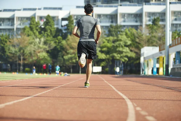 Young Asian Man Male Athlete Running Training Exercising Track Rear — Stock Photo, Image