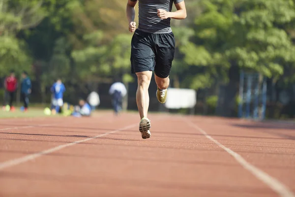 Young Asian Man Male Athlete Running Training Exercising Track Stock Image