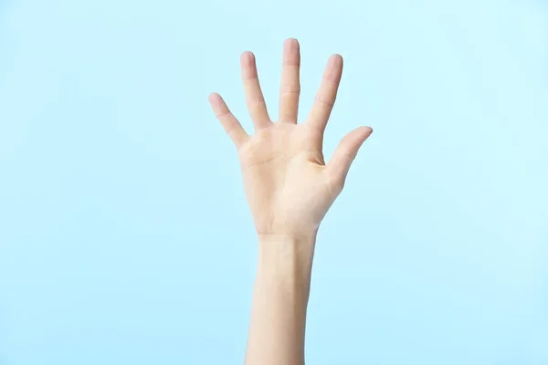 Ludzka ręka pokazująca numer pięć — Zdjęcie stockowe