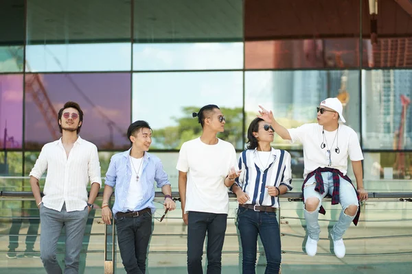 asian young people hanging out on street