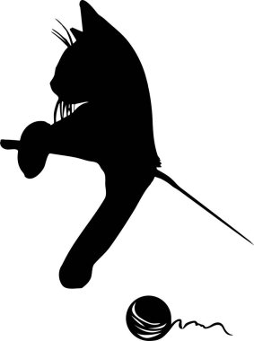 the cat plays a ball of thread