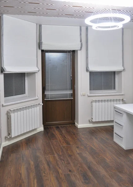 light roman blinds in the interior of the room