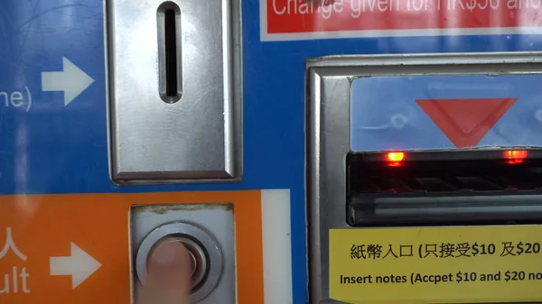Buying Star Ferry Transport Ticket at Automated Ticket Machine - Hong Kong - April, 2018