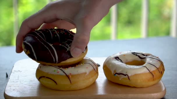 Shuffling Around Donuts Like Poker Chips — Stock Video