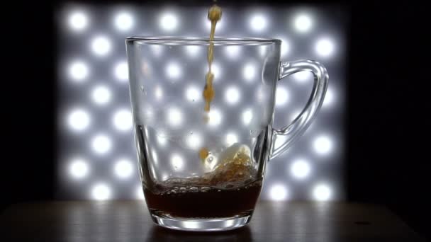 Pouring Steaming Freshly Brewed Black Coffee into Glass Cup in Kitchen — Stock Video