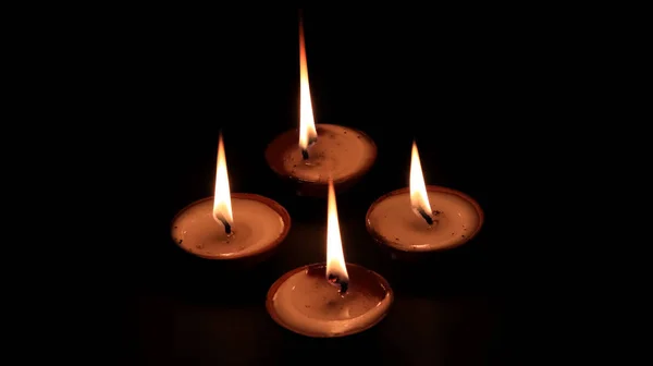 Four Butter Lamp Candles Glowing Dark Mainly Used Diwali Deepawali — Stock Photo, Image