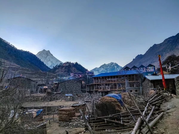 Lho village of Manaslu Conservation Area in Nepal. Mount Manaslu on the left side is the 8th largest mountain in the world.