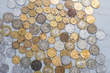 Çeşitli altın ve gümüş Nepal Bozuklukları arka planı.