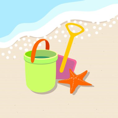 oyuncaklar ve denizyıldızı deniz kıyısı dalga üzerinde kum