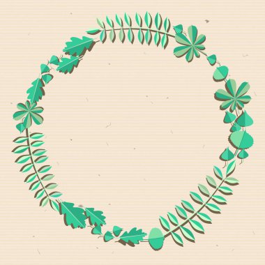 Bej renkli arka plan üzerinde çeşitli yeşil yaprakların çelenk