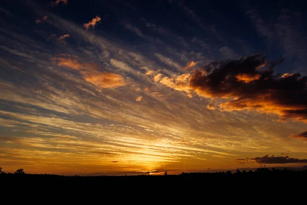 Natural Sunset Sunrise Over Field Or Meadow. Bright Dramatic Sky And Dark Ground. Countryside Landscape Under Scenic Colorful Sky At Sunset Dawn Sunrise, australia