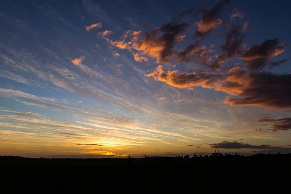 Natural Sunset Sunrise Over Field Or Meadow. Bright Dramatic Sky And Dark Ground. Countryside Landscape Under Scenic Colorful Sky At Sunset Dawn Sunrise, australia