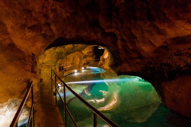 A water pool in River Cave at the Jenolan Caves at the Blue Mountains of New South Wales, Australia. clipart