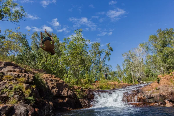 Young man doing a salto in the Buley Rockhole in Litchfield National Park, Northern Territory, Australia — Stock Photo, Image