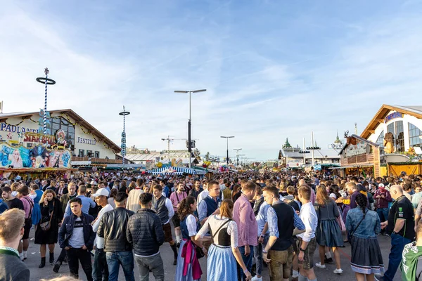Munich, Germany - 2019 September 29: visitors, beertents and candy shops on the oktoberfest in munich — Stock Photo, Image