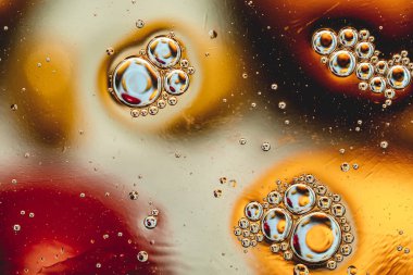 olorful vibrant abstraction. Background. Bubbles on the water set the dynamics of the picture and fill it with life
