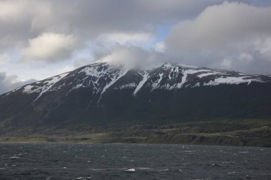 Bulutlu güneşli bir okyanus, Antarktika yatay