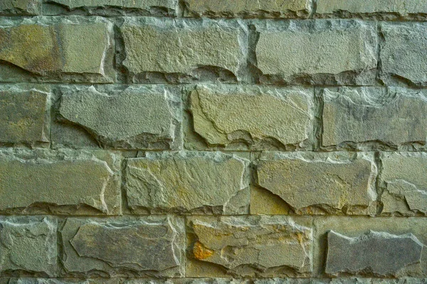 Alte Steinmauer in Nahaufnahme lizenzfreie Stockbilder