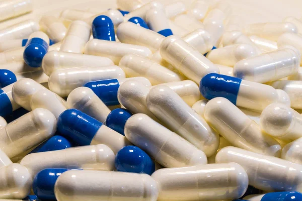 Handful White Blue Pills Close Capsules Medications White Blue — Stock Photo, Image