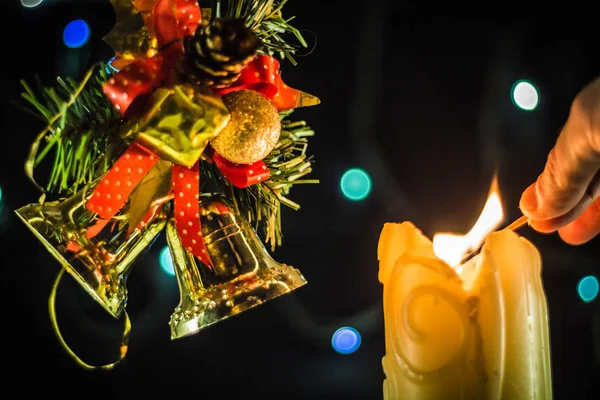 Sparkling Candle Lights Hand Match Branches Christmas Tree Bells — Stock Photo, Image