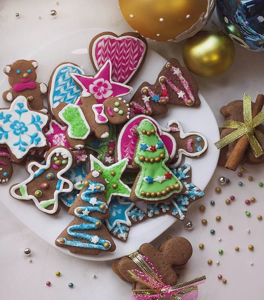 Christmas gingerbread cookies decorated colored icing for new year day, christmas party, winter holiday, sweet homemade gift for kids — Stock Photo, Image