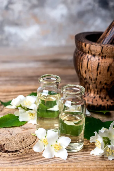 Essential Jasmine Oil Jasmine Flowers Mortar Wooden Background — Stock Photo, Image