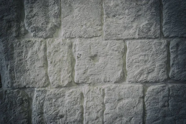 White stone wall texture, background. Stones tenth century.