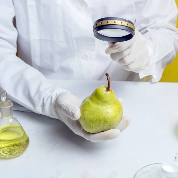 Food safety inspector testing fruit from the market