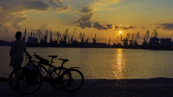 stock image Two bicycle silhouette on a sunset. Summer landscape.