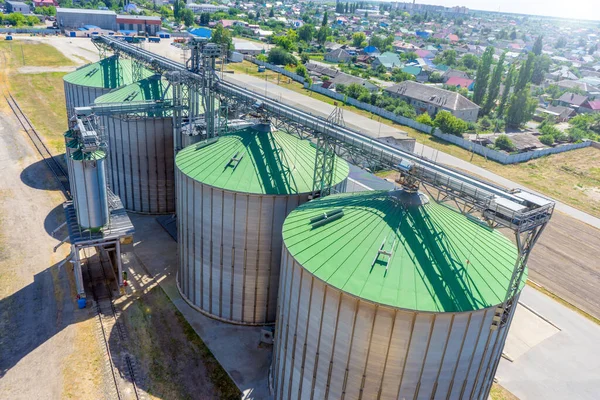 Photo Industrial elevator, top view. High angle aerial view of industrial elevators and dryers.