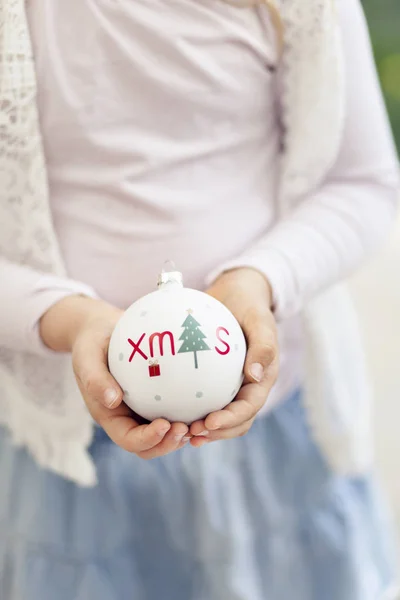 Little Girl Holding Beautiful Christmas Bauble Hands Close — Stock Photo, Image