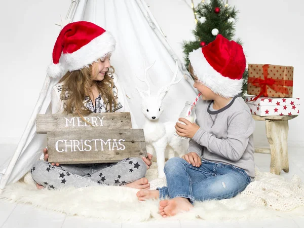 Adorable Little Kids Santa Hats Spending Time Tent Christmas Tree — Stock Photo, Image