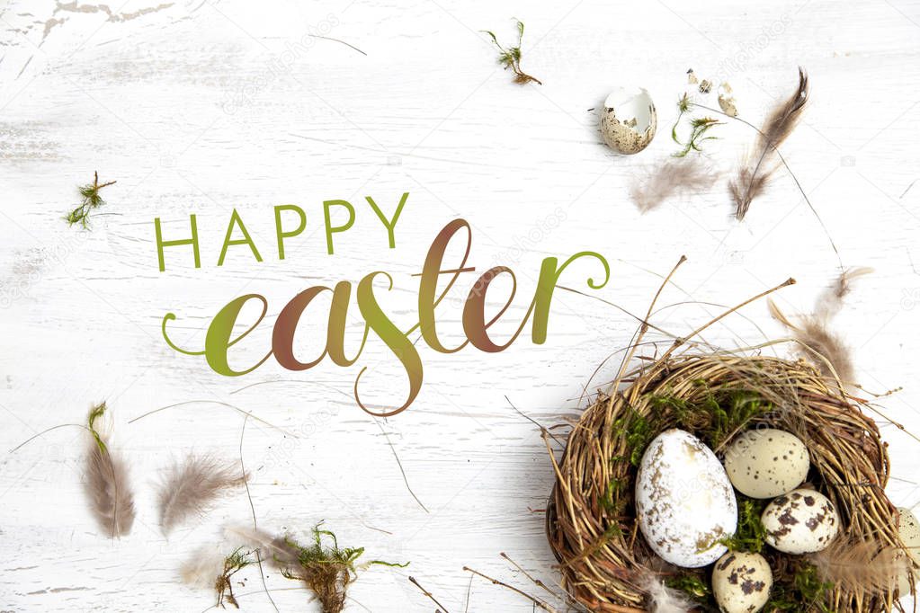 nest and eggs with text happy Easter on light wooden background, holiday concept  