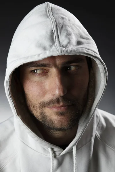 Portrait Captivating Handsome Man White Hood Posing Dark Background — Stock Photo, Image