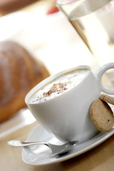 coffee cup with pie and glass of water on background, close-up