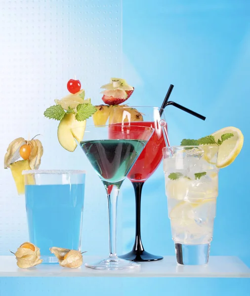 collection of cocktails with fruit decoration in glasses, close-up