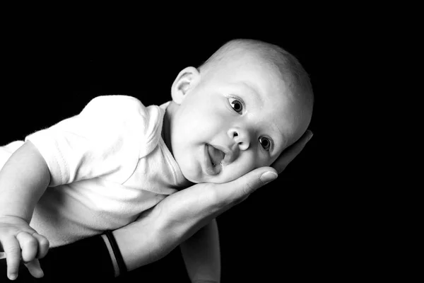 Cute Little Baby Lying Mother Hand Black Background Close View — Stock Photo, Image