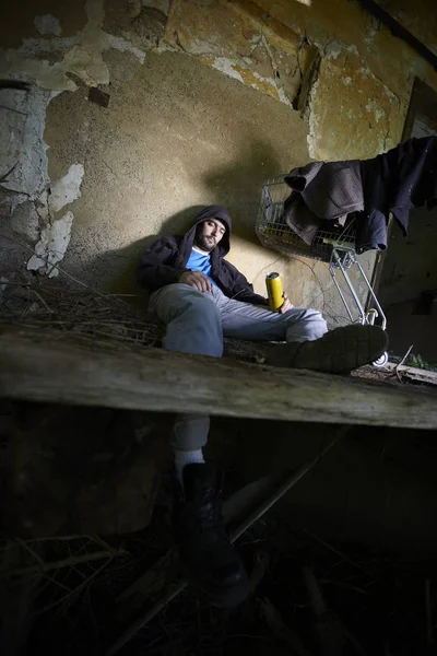 Bearded Homeless Man Dirty Hoodie Sitting Floor Beer Can Hand — Stock Photo, Image