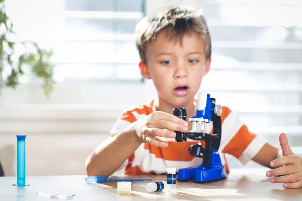 Little Boy Frustrated While Working Microscope Home — Stock Photo, Image