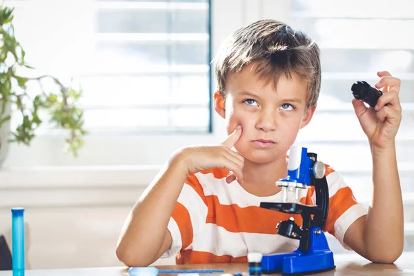 Thoughtful Little Boy Dreaming While Working Microscope Home Idea Concept — Stock Photo, Image