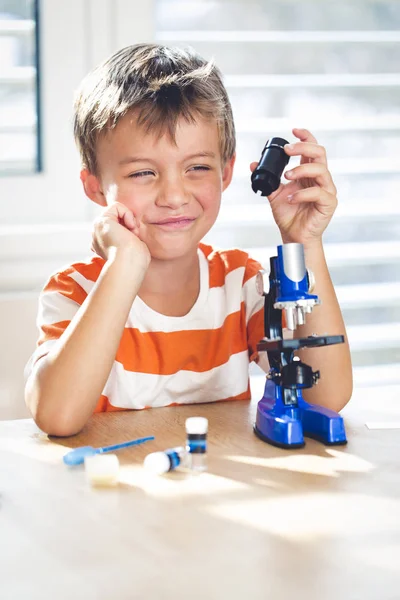 Thoughtful Little Boy Dreaming While Working Microscope Home Idea Concept — Stock Photo, Image