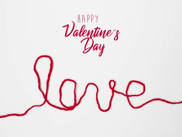 Word Love Written Red Thread Isolated White Background Close Valentine — Stock Photo, Image