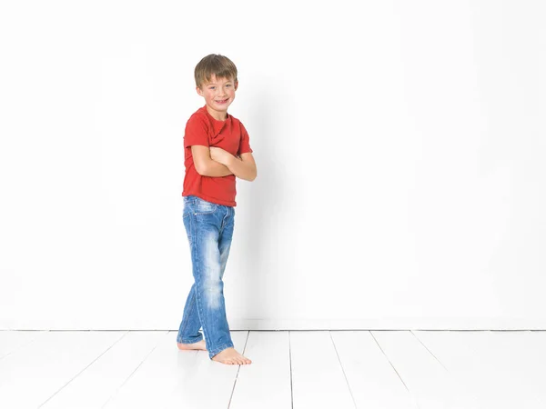 Cute Blond Boy Red Shirt Blue Jeans Standing Crossed Arms — Stock Photo, Image