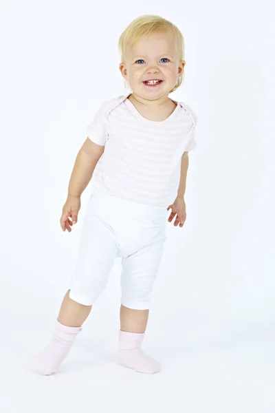 Petit Bebe Mignon S Amusant Et Posant Isole Sur Fond Blanc Peu Gros Plan Stock Photo