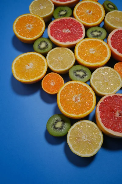 Assortment Various Cut Raw Fruits Blue Background Copy Space — Stock Photo, Image