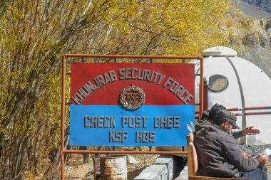 A signboard of security force at the Khunjerab checkpoint. Gilgit Baltistan, Pakistan. clipart