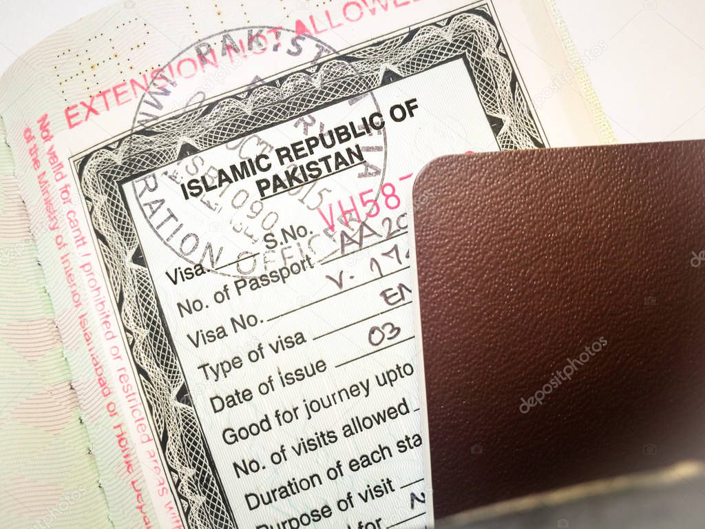 Pakistan visit visa for tourist stamp in a Thai passport.