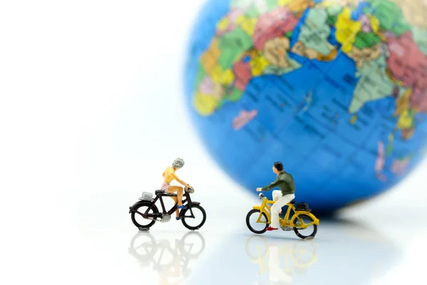 Miniature people : Couple going for a bike ride with mini world using for concept of Go For A Ride Day.